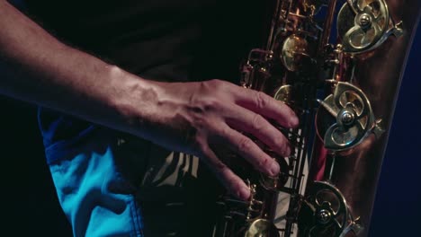 close-up of jazz saxophonist playing an intense moment