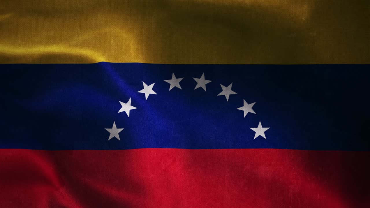 Bandeira venezuelana a agitar-se no vento