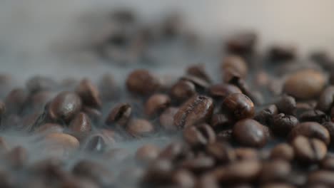 close-up of a smoke drifts over the coffee bean