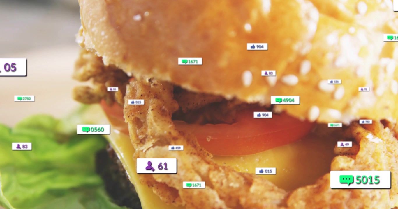 Sesame bun moving down as camera zooming, UI badges multiplying over cheese, showing food marketing