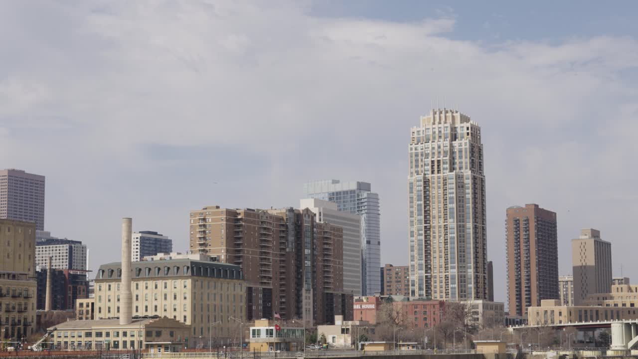 Daytime Sky With Cloudscape Passing Over Minneapolis Skyline In Minnesota, United States. Timelapse