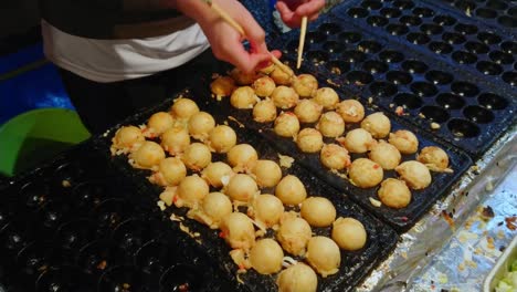 baking dumplings on a traditional japanese street food festival