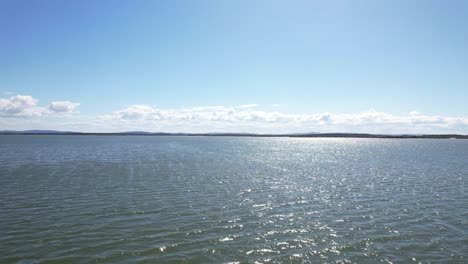 Flying-above-calm-waters-of-Wooloweyah-Lagoon