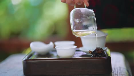 pouring tea in a traditional ceremony