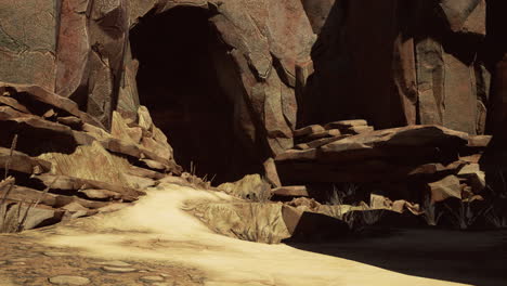 mysterious cave entrance in a rocky desert landscape