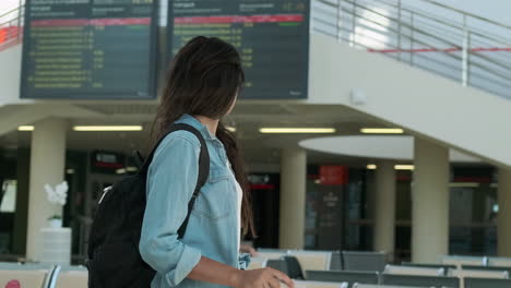 woman waiting at train station