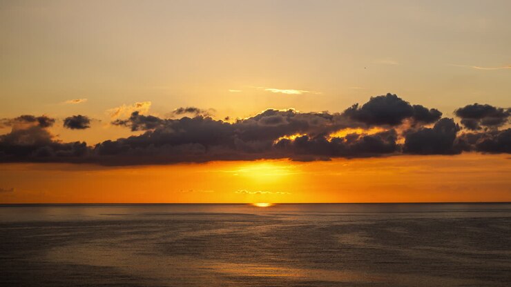 Picturesque Sea Sunset with Clouds