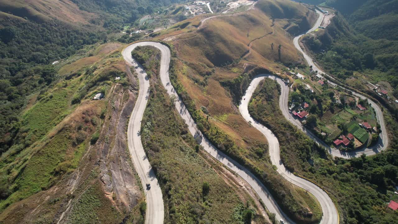 Winding mountain road with scenic views in Junquito, Venezuela