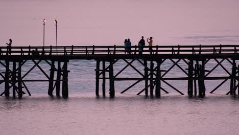 The-Mon-Bridge-is-an-old-wooden-bridge-located-in-Sangkla,-Thailand