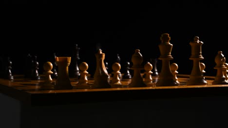 cinematic shot of chess pieces on a chessboard, the background is black with the lightsource coming from the right