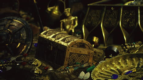 Treasure chest surrounded by gold coins and artifacts in an ancient setting