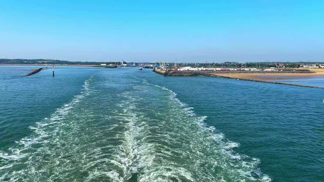 Ship travelling the English channel. Blue water giving rise to a white waves