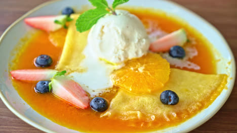 crepe suzette with vanilla ice-cream and fresh fruit