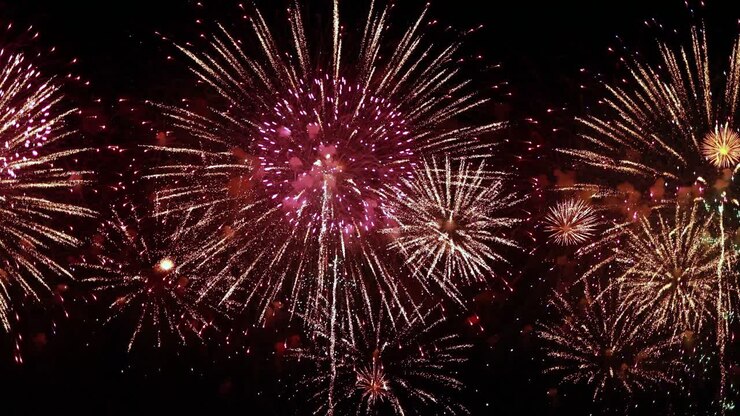 Colorful fireworks exploding in the night sky. Celebrations and events in bright colors.