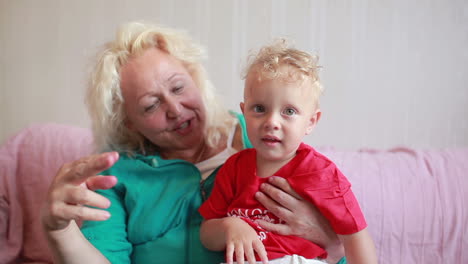 happy grandmother with her little grandson