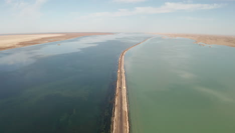 the lake with a path in the middle.