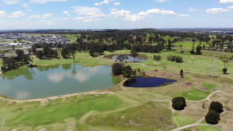 aerial of a golf course in gledswood hills australia