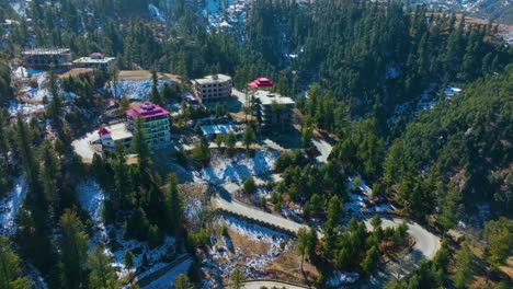 orbit drone footage of the hotel on top of the mountain in malam jabba sawat in northern pakistan