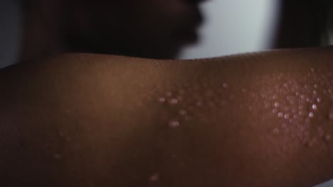 close up shot of beads of sweat on woman wearing gym fitness clothing exercising 2