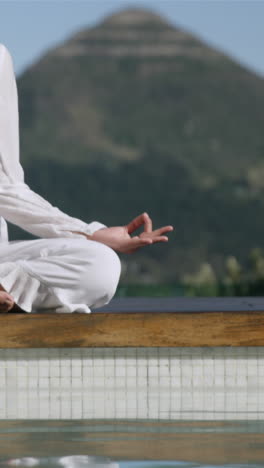 calm brunette doing yoga