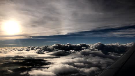 incredible cloudscape as seen through airplane window.