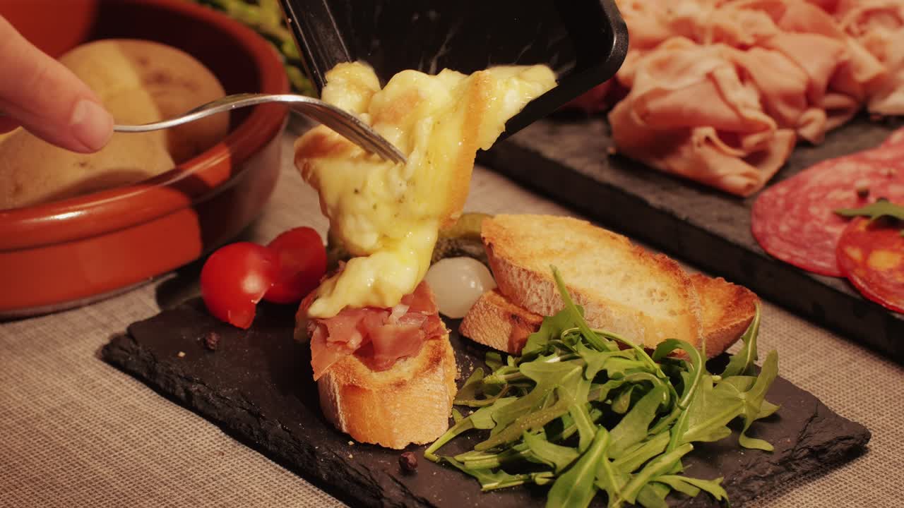 Italian or Spanish restaurant with traditional tapas food, Spanish cuisine, delicious tapas and cheese plate, bruschetta with cheese, olives dry tomatoes and tasty sandwich bar appetizer, buffet