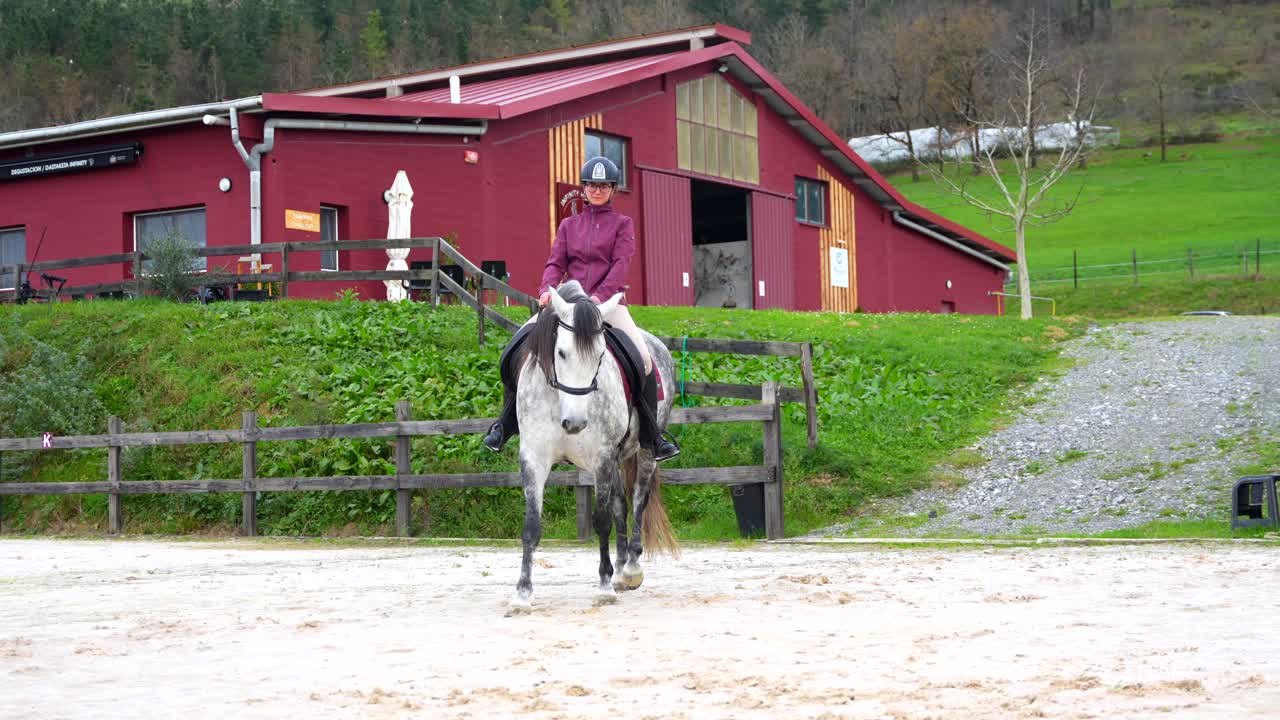 Woman Riding a Horse Outdoors