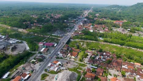 Traffic-on-highway-through-Kali-Putih-Bridge,-infrastructure-of-Java,-Indonesia