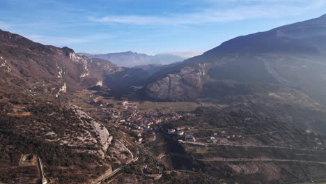 aerial view of valley with mountains in italy near garda lake