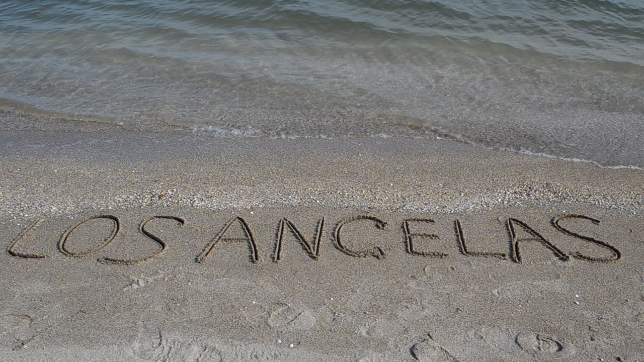 Indskrift på stranden. Optagelse på stranden. Optagelse på stranden.