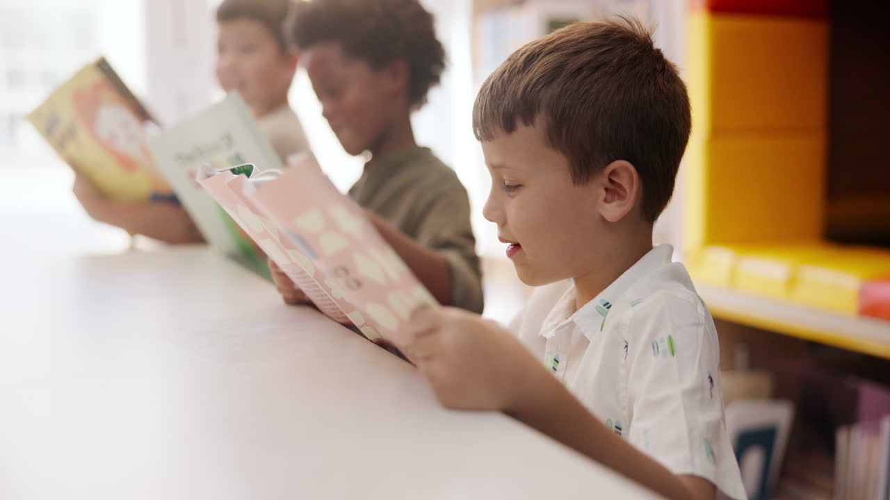 Children reading books in the library