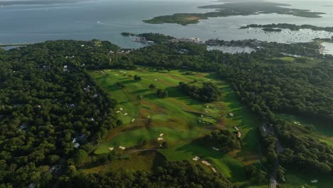 Drone shot of the Woods Hole Golf Club nestled in Cape Cod&#039;s rural countryside