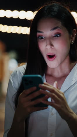 woman looking at her phone