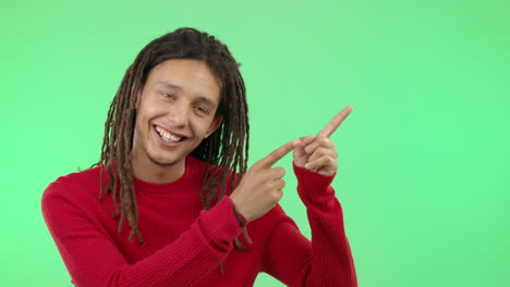 face of young man pointing isolated on studio