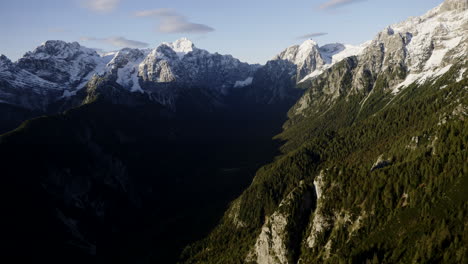 alpine valley with snow-capped peaks
