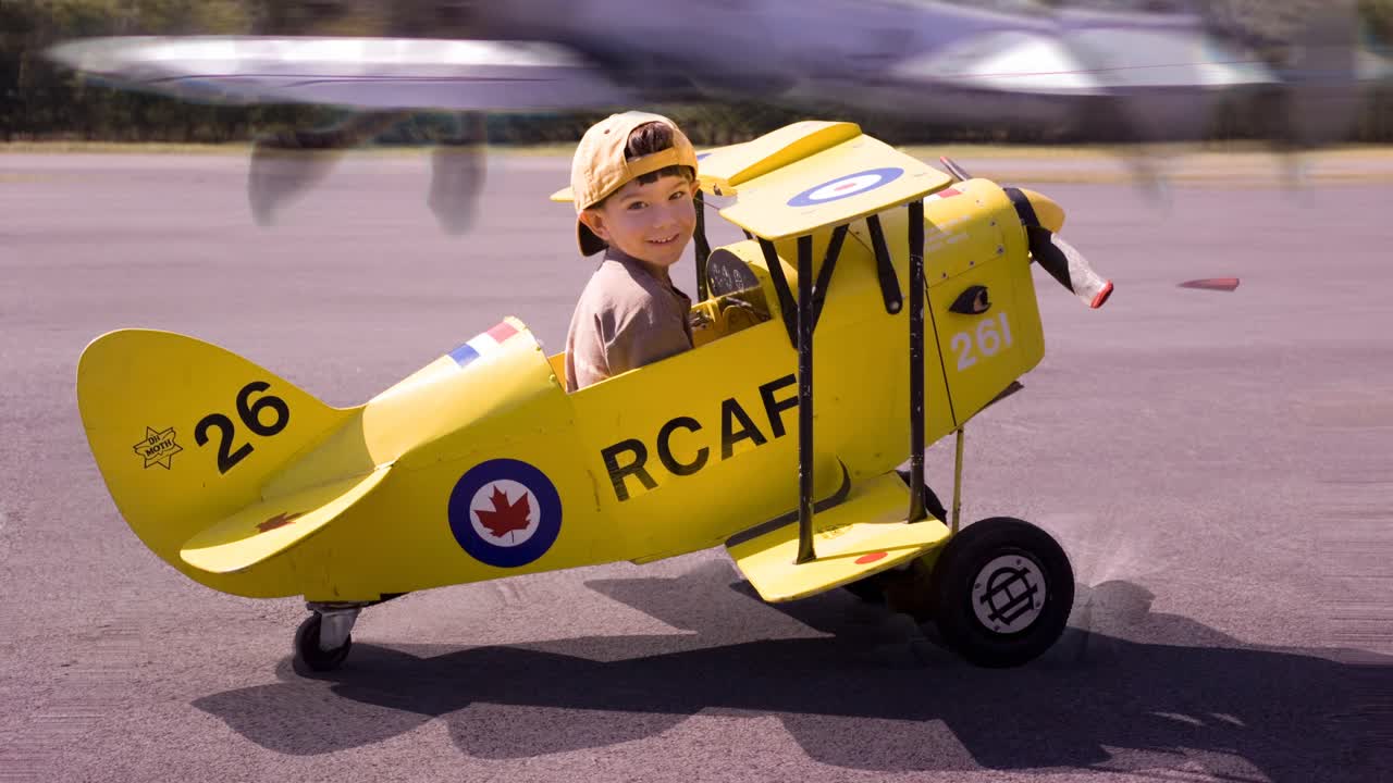 Boy in a Toy Airplane
