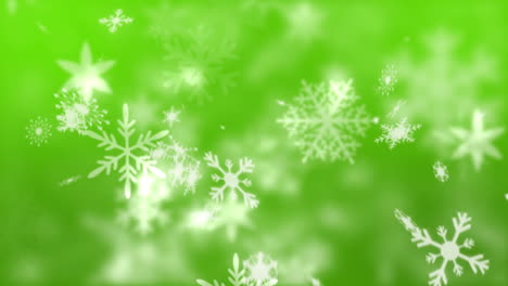 copos de nieve sobre un fondo verde
