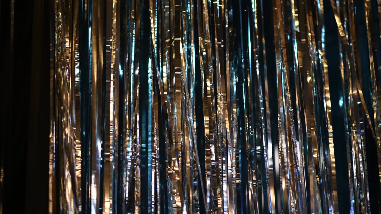 fondo del movimiento de cintas de plata y oro