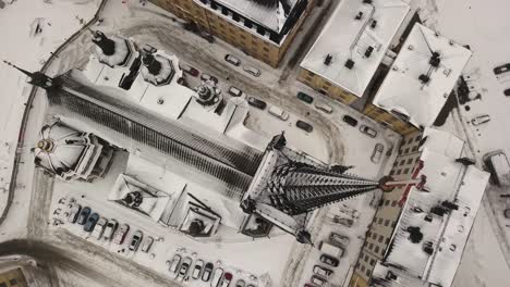 Smooth-top-down-view-over-historical-old-church-of-Riddarholmen-in-the-capital-of-Sweden,-Stockholm