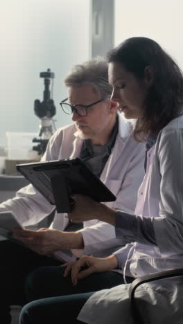 scientists reviewing data in a laboratory