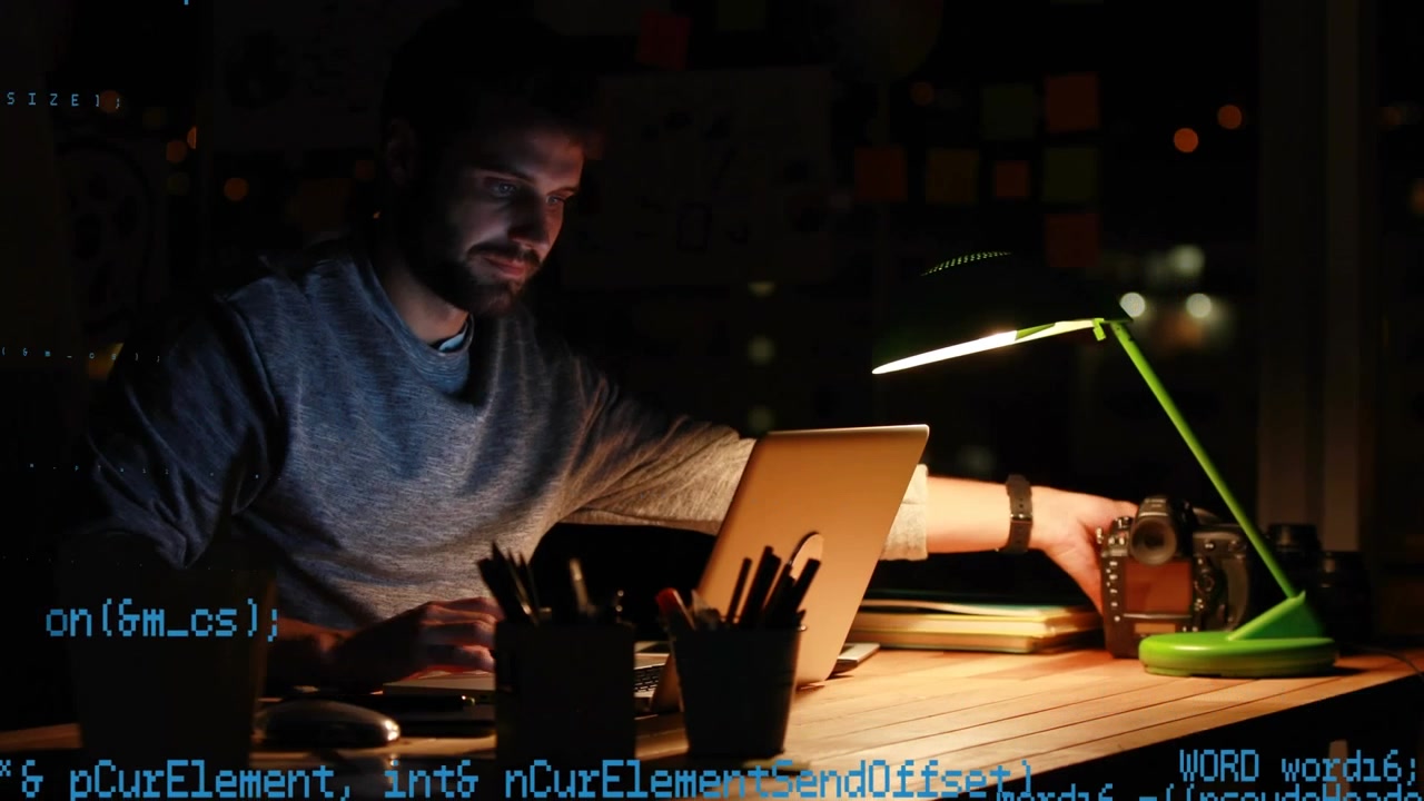 Animation of data processing over caucasian man using laptop