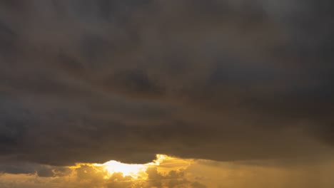 time lapse cloudy in golden sky in sunset.