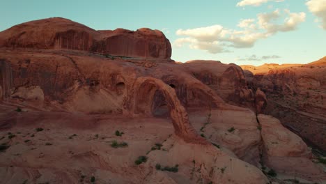 close panning shot to the left of corona arch at golden hour