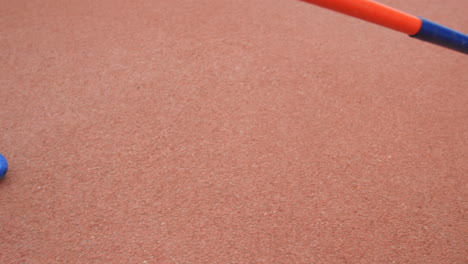 low section of female athlete holding a javelin throw at sports venue 4k