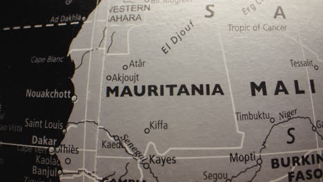 close-up view of a globe showing west african countries