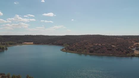 Aerial-drone-taking-off-reveal-amazing-scenery-of-Lagunas-de-Ruidera-Natural-Park