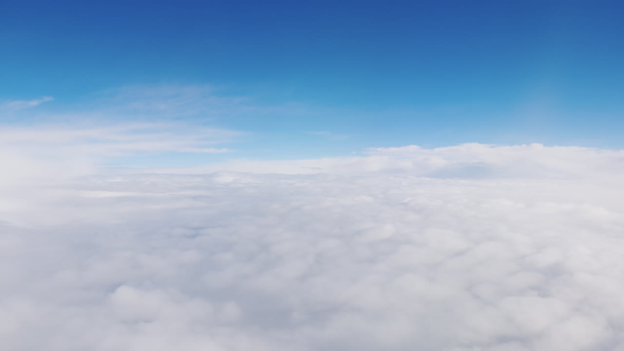 vista desde la ventana del avión en las nubes - volar entre las nubes
