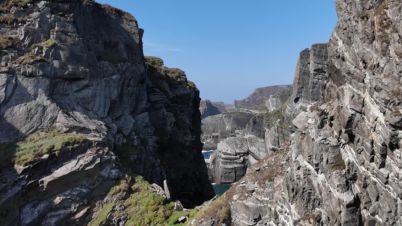 Dramatic, pointy layers of rock and cliffs alongside coastal West Cork, Ireland. MIzen Head cliff
