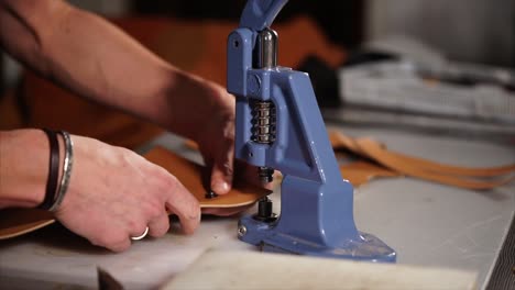 Leatherwork in progress with an industrial machine