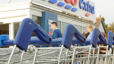 shopping trolleys outside tesco supermarket